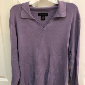 Harold’s purple v neck sweater